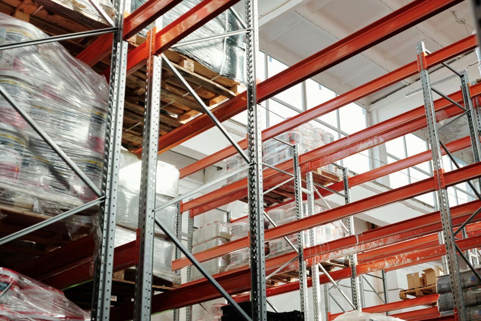 Warehouse with extensive orange racking systems